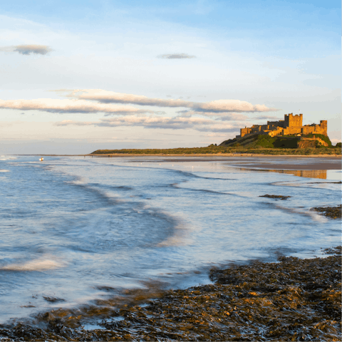 Explore the spectacular Northumberland coastline – Bamburgh castle is a short drive away