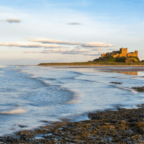 Explore the spectacular Northumberland coastline – Bamburgh castle is a short drive away