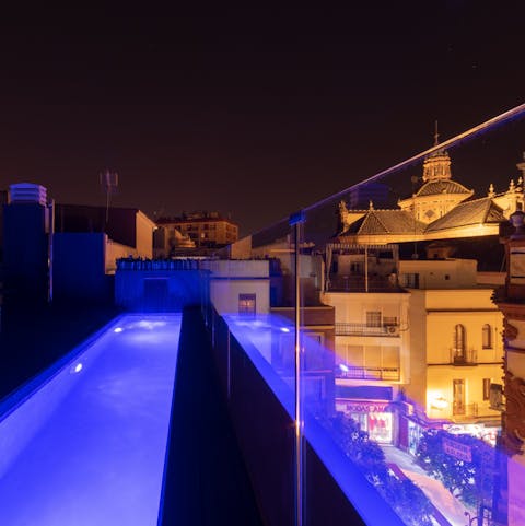 Enjoy a late night dip in the rooftop pool, overlooking the steeple of Santa María Magdalena