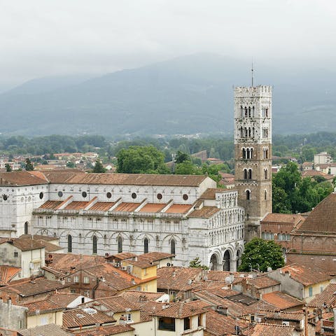 Wander around the medieval architecture of Lucca, only fifteen minutes away in the car
