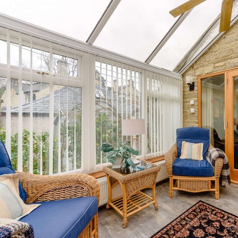Enjoy the feeling of winter sun streaming in through the conservatory windows as you sink into an armchair