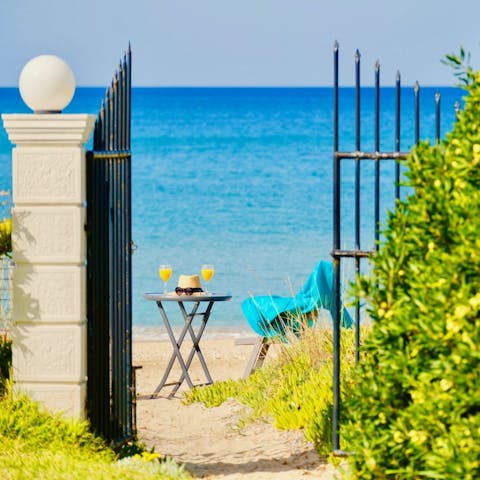 Step onto Almyros beach straight from your private garden