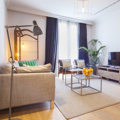 Relax in the stylish living space after a busy day of sightseeing