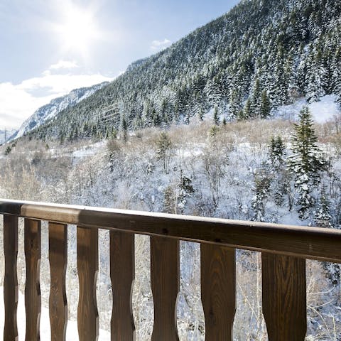 Admire the breathtaking views of the mountains from your private balcony
