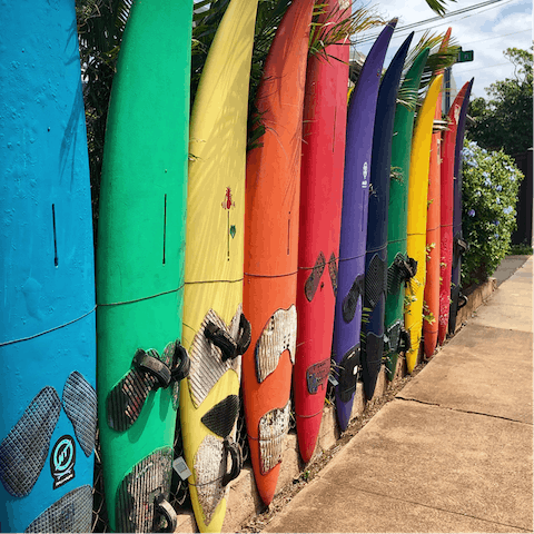 Go surfing at Longsands Beach, a twenty-minute walk away