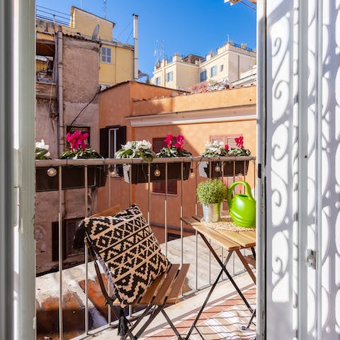 Snatch a moment of sunshine on the private balcony, a glass of Italy's finest wine in hand