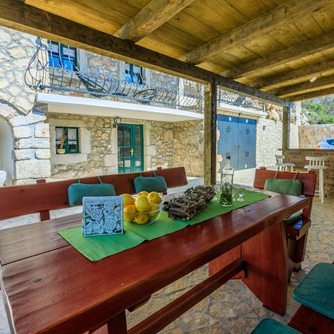 Dine alfresco on the sheltered open-air table