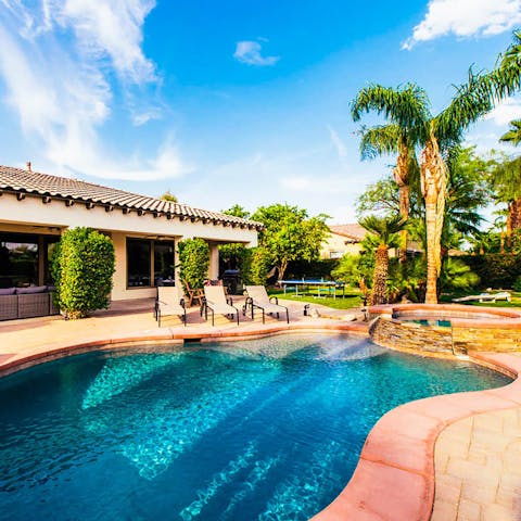 Stretch out on the loungers then enjoy a cooling dip in your freeform pool