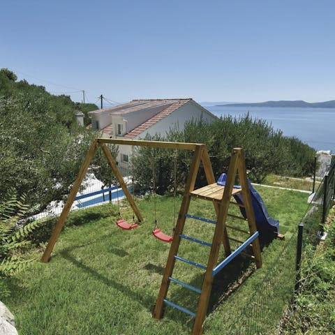 Watch as little ones let loose on the playground, tiring themselves out before bed