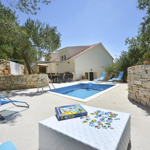 Cool off from the Croatian sun with a dip in the private swimming pool