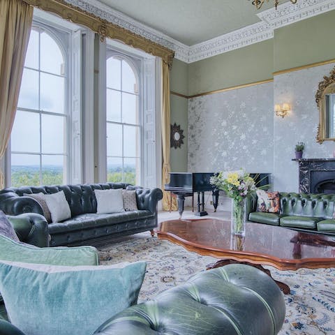 Gather for cocktails in one of two grand lounges with countryside views