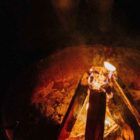 Cosy up for an evening of stargazing beside the fire pit