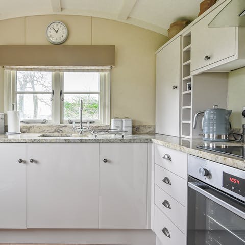 Whip up a bite to eat in the sleek, modern kitchen