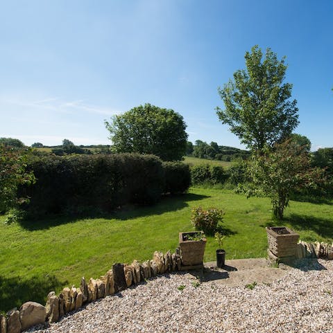 Soak up the countryside views from the garden