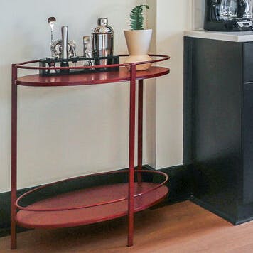 Mix up a cocktail using the bar cart accessories