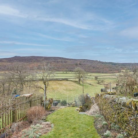 Enjoy your morning coffee in the garden with a view of rolling hillsides