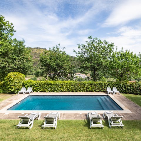 Step into your pristine private pool or sun yourself on the loungers
