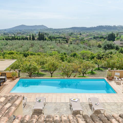 Spend afternoons splashing in the pool and admiring the view