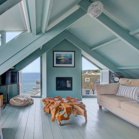 Sit back and relax with glorious coastal views in the cosy loft