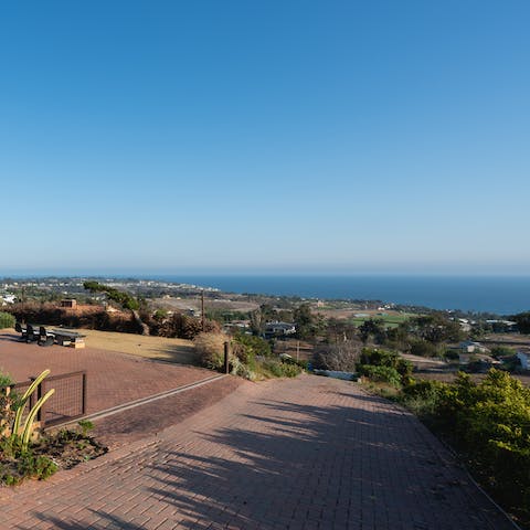 Marvel at the stunning views of the Pacific Ocean from this home's elevated position