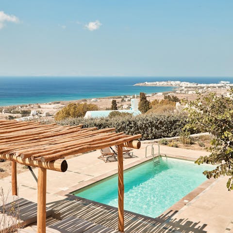 Cool off with a dip in the refreshing pool, admiring the Aegean views