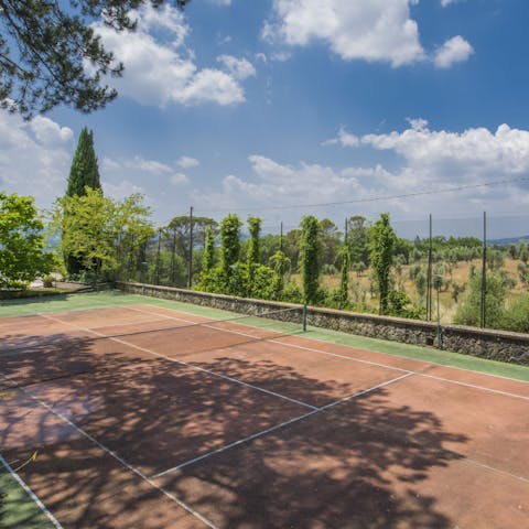 Play a game of tennis with views over Arezzo