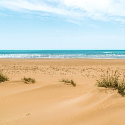 Hang out on Mannera Beach, just footsteps from the villa