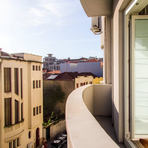 Pad onto the small balcony to admire the hustle and bustle below