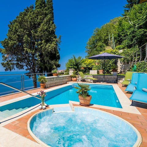 Relax in the hot tub or float about in the swimming pool