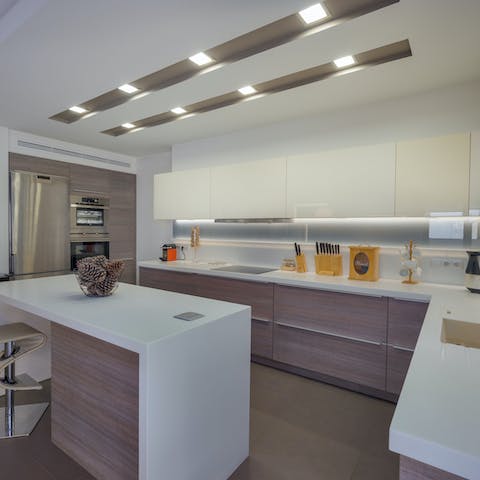 Rustle up a home-cooked meal in the sleek kitchen for a quiet night in