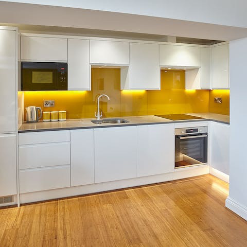 Rustle up brunch in the sleek, newly-fitted kitchen