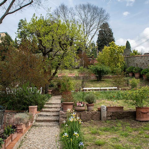 Sip cocktails in the garden while the little ones play