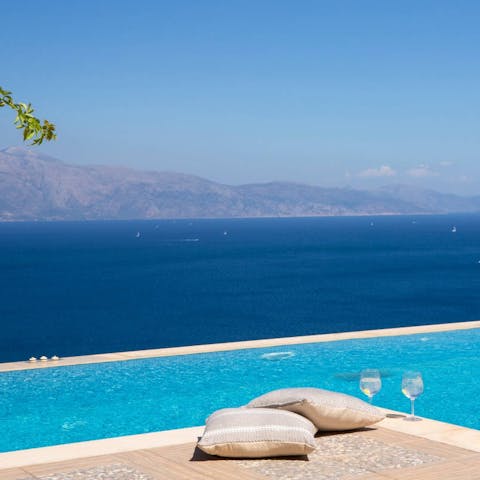 Admire the incredible Ionian Sea views from this romantic poolside spot
