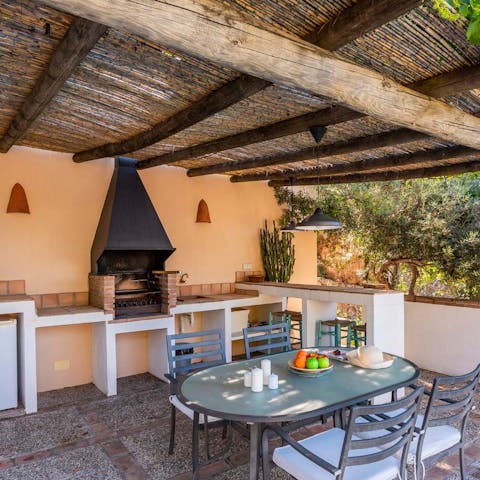 Cook in southern Spanish style at the full outdoor kitchen