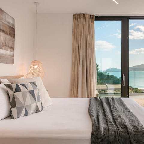 Wake up to the Ionian Sea in the chic bedrooms