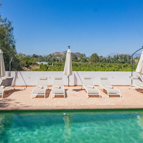 Cool off with a dip before enjoying cocktails by the pool