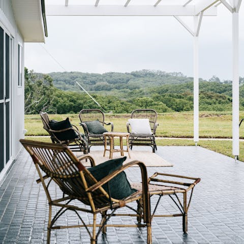 Relax on the veranda with a glass of Australian wine