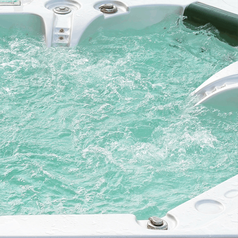 Soak in the hot tub to relax your muscles after a gym session