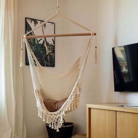 Hang out in the living room's swing chair