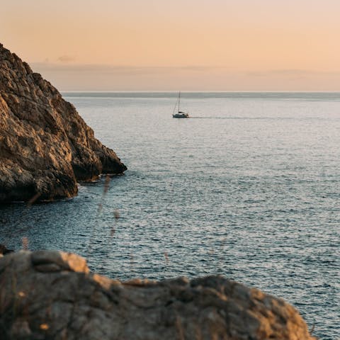 Drive fifteen minutes to the small coves of Sa Torre for a day at the beach