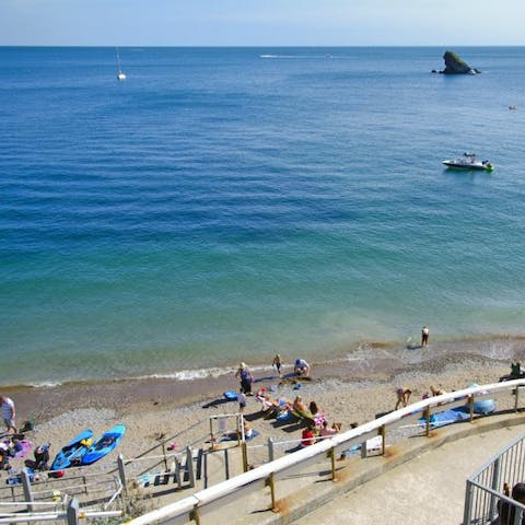 Spend sunny afternoons at Meadfoot Beach, less than a five-minute walk away