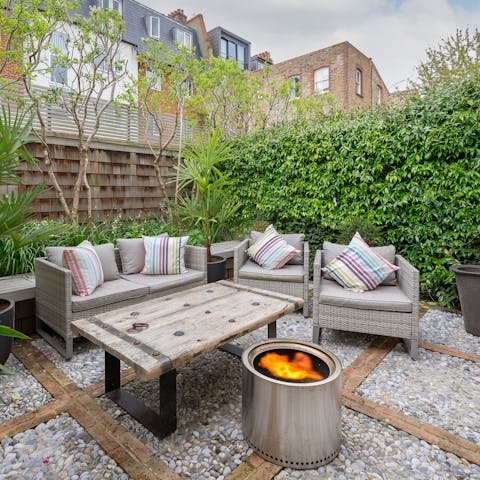 Spend cosy evenings gathered around the fire pit