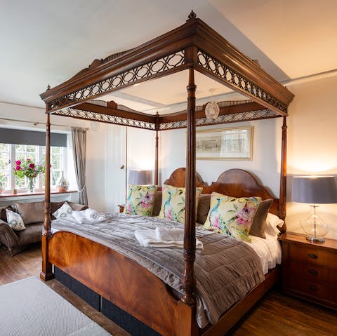 Enjoy a restful night in the four poster bed