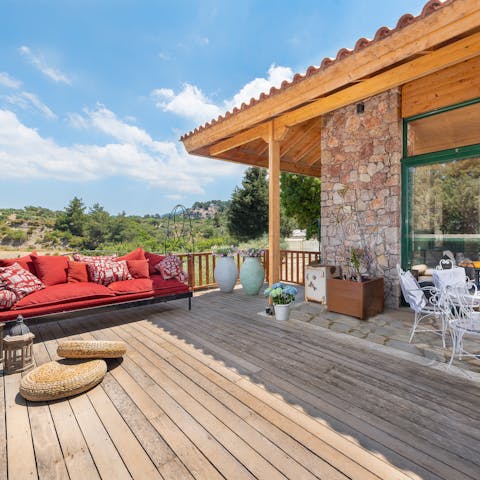 Relax on the home's expansive deck