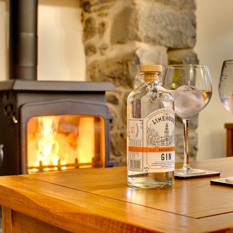 Warm the cockles next to the woodburner while sipping local Welsh gin