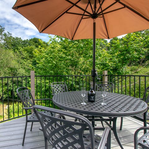 Gather around the table on the terrace while feeling immersed in nature
