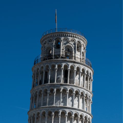 Make a day trip to Pisa, a forty-minute drive away