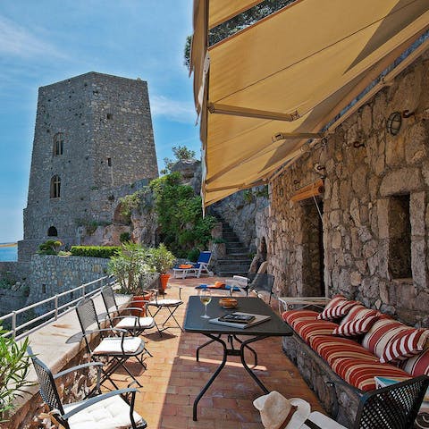 Pick your favourite spot in the shade as you read with a glass of wine