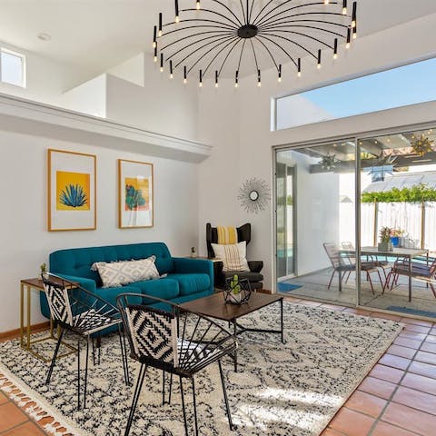 Gather on the velvet sofa for a few games of cards and margaritas