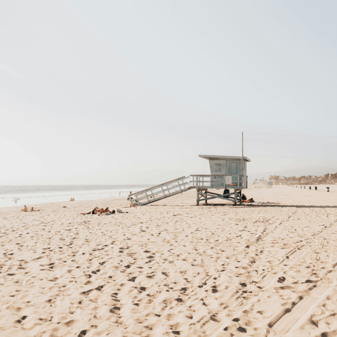 Drive five minutes to Venice Beach and sprawl out on the sand